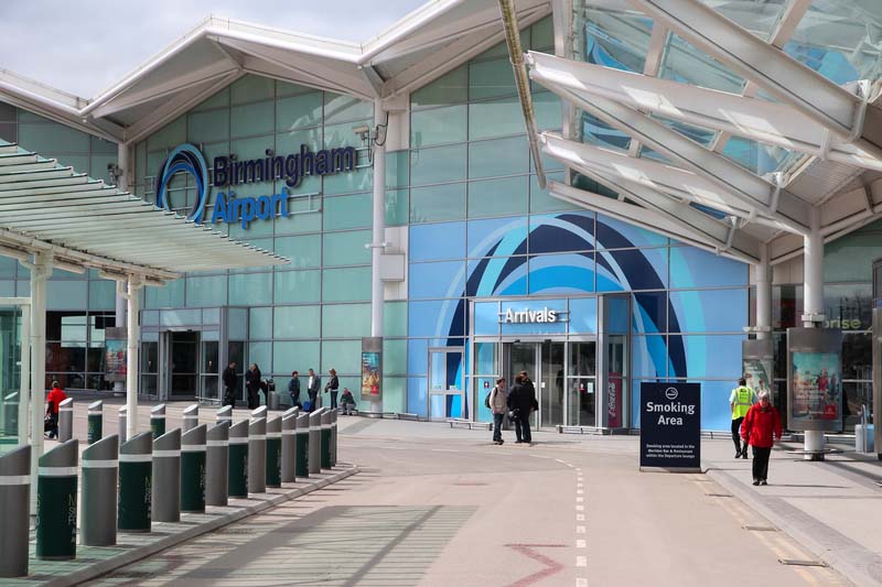 Birmingham Airport UK. BIRMINGHAM, UK - APRIL 19, 2013: Travelers visit Birmingham International Airport, UK. With 8. 9 million travelers served it was the 7th busiest UK airport in 2012